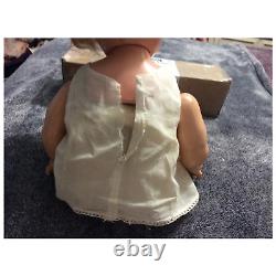 18 inch Shirley Temple Baby doll with tagged dress