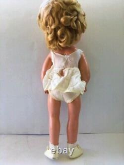 1930s SHIRLEY TEMPLE 16 COMPOSITION DOLL IN RARE NRA TAGGED YELLOW BOLERO DRESS