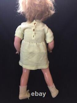 1930s VINTAGE SHIRLEY TEMPLE DOLL with KNIT DRESS, BOOTIES, CAP & SCARF DAMAGED