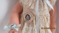 22 Inch Shirley Temple Composition Doll pin and tagged dress