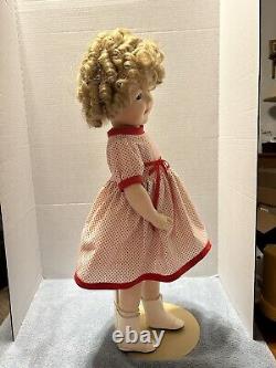 24 Shirley Temple Porcelain Doll. Good Condition