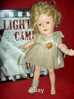 Ideal 13 compo. SHIRLEY TEMPLE doll with orig. Tagged clothes & wig, clear eyes