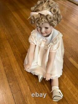 Porcelin Shirley Temple doll in excellent condition