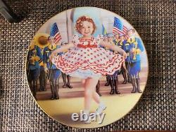 Shirley Temple Collection Dolls, Plates. Stamp Book, Pins, VHS, and Portrait