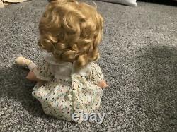 Shirley temple 13 inch doll with tagged dress and pin