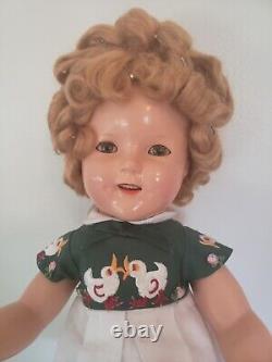 Shirley temple composition doll 18- golden/ reddish blonde wig