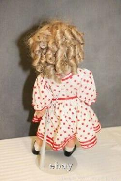 This free-standing doll is 24 tall. The name Shirley Temple is on the back o