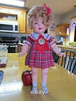Vintage Shirley Temple compo doll, original tagged dress and pin, 18 AS-IS