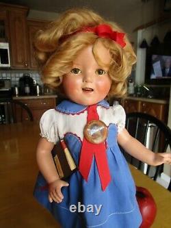 Vintage Shirley Temple composition doll withorig pin, replaced dress, 17 AS-IS