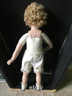 Vintage Shirley Temple doll with pink eyes Elke Hutchins