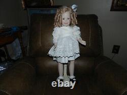 Vintage Shirley Temple porcelain jointed doll by rupert 1995