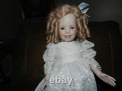 Vintage Shirley Temple porcelain jointed doll by rupert 1995